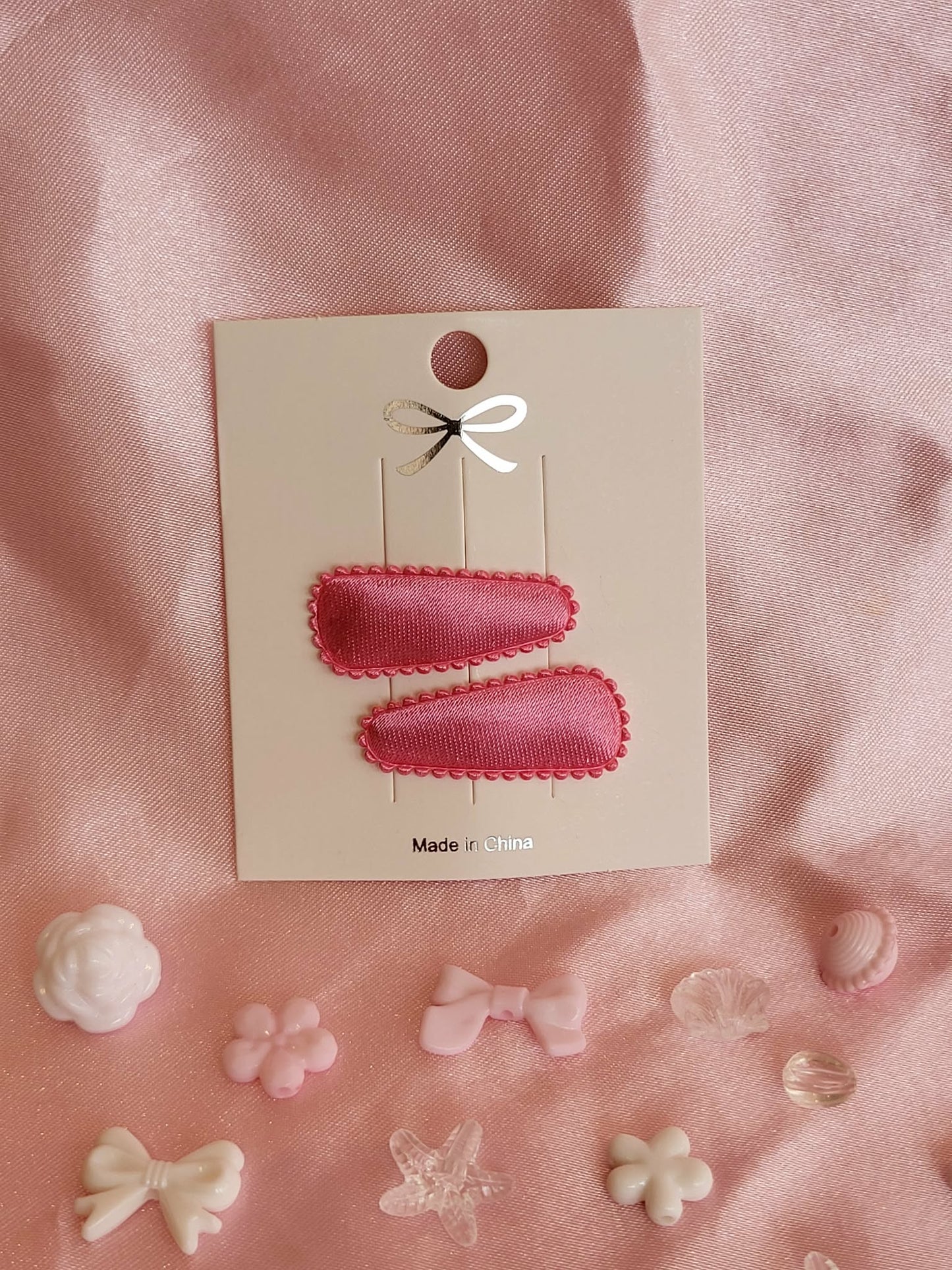 Baby klikspeld satijn roze