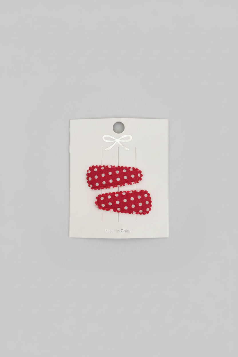 Baby klikspeld rood met witte stippen