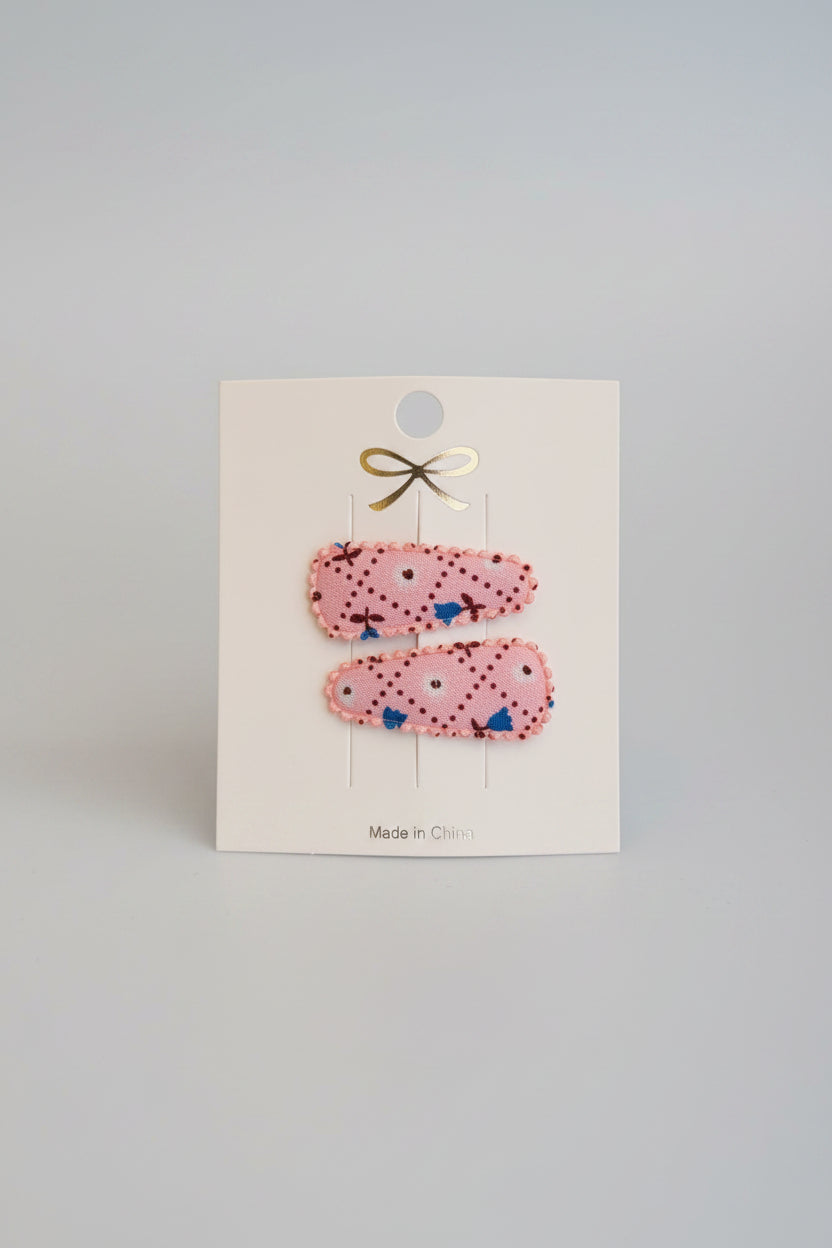 Baby klikspeld roze met kleine bloemetjes