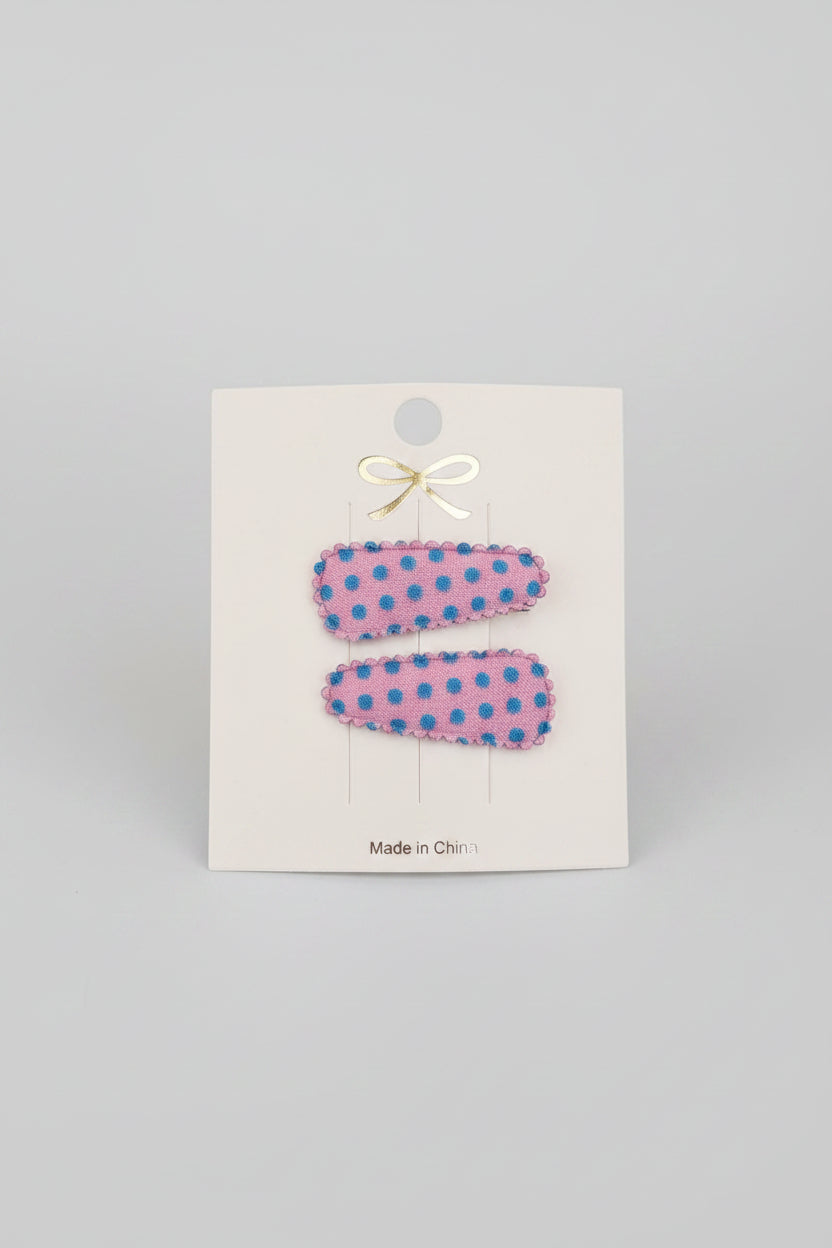 Baby klikspeld roze met blauwe stippen