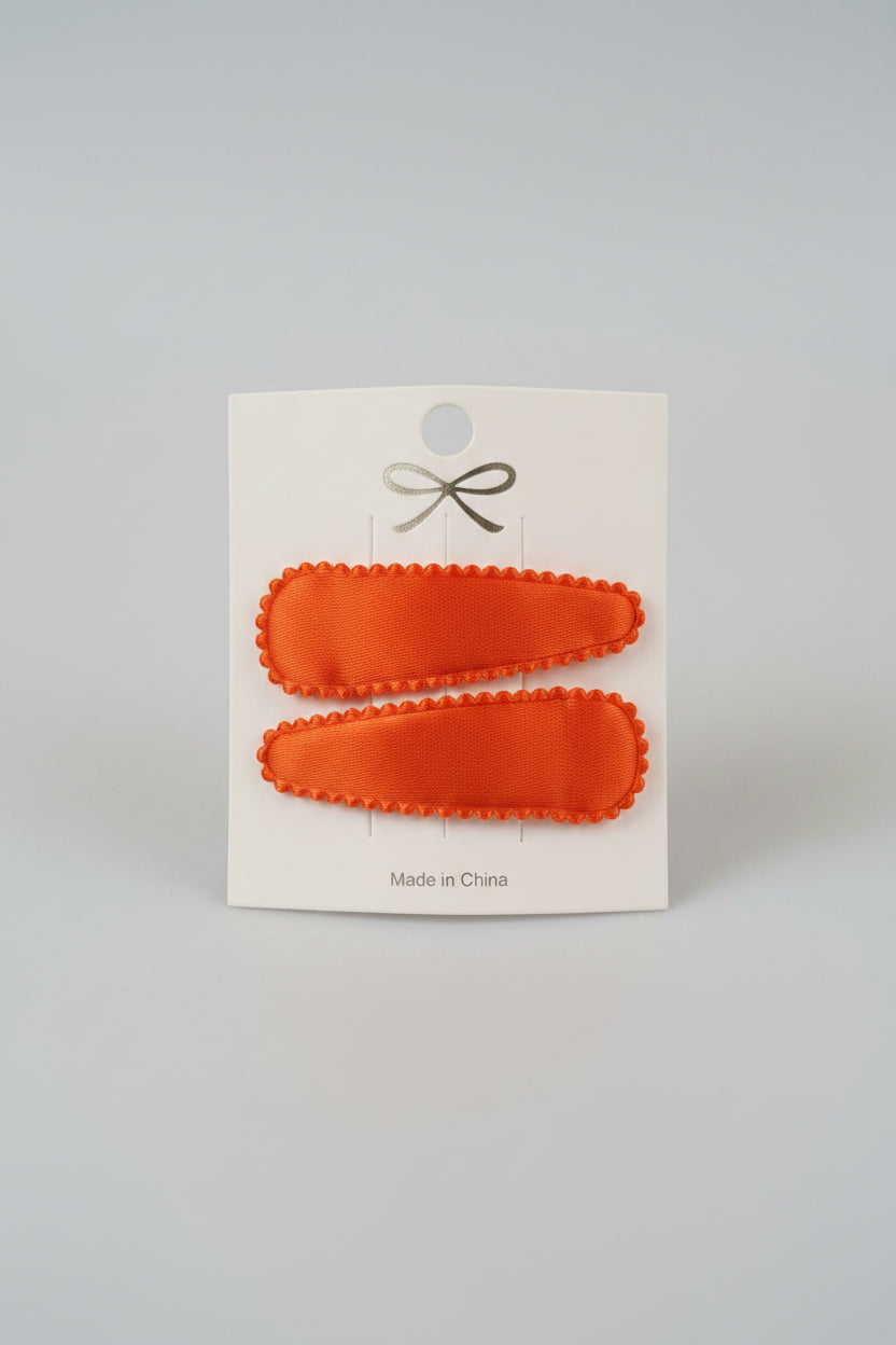 Kind klikspeld satijn oranje