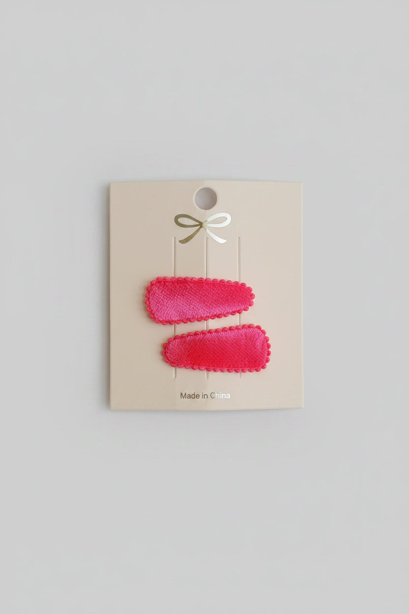 Baby klikspeld fluweel neonroze