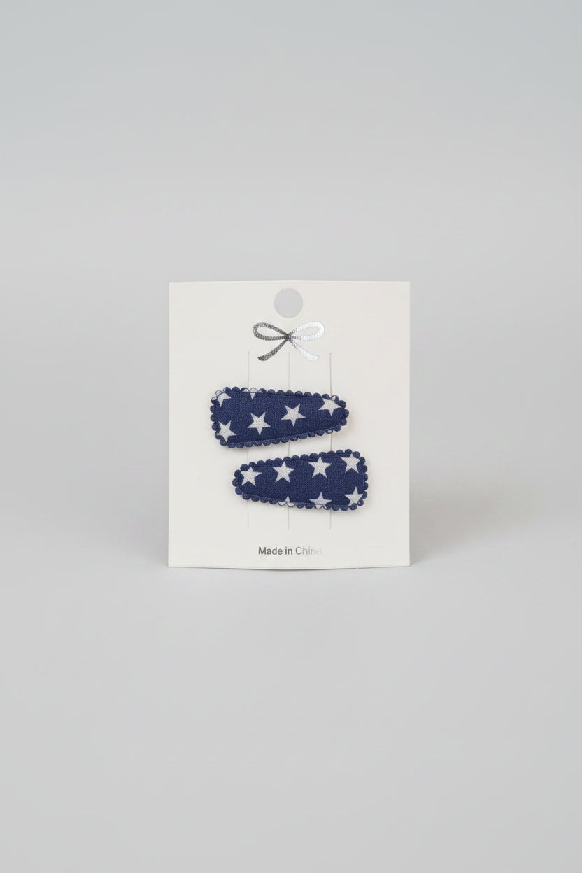 Baby klikspeld donkerblauw met witte sterren