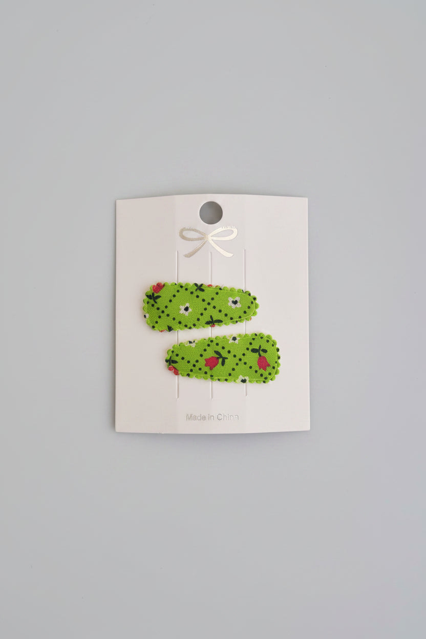 Baby klikspeld groen met kleine bloemetjes
