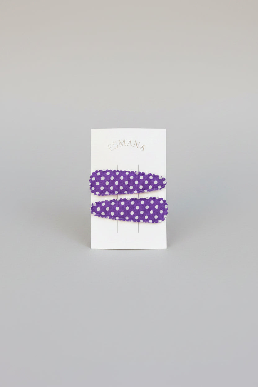 Kind klikspeld paars met witte stippen