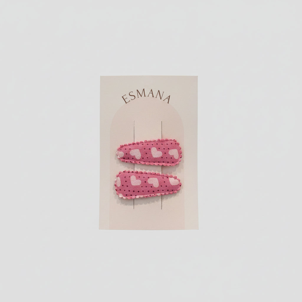 Baby haarspeld roze met lichtroze hartjes