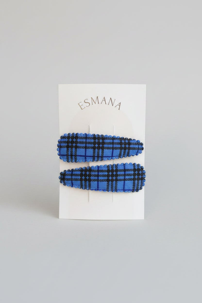 Kind klikspeld blauw schots patroon