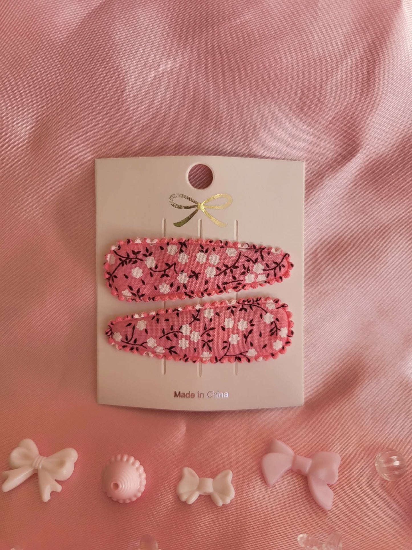 Kind klikspeld roze vintage bloemen