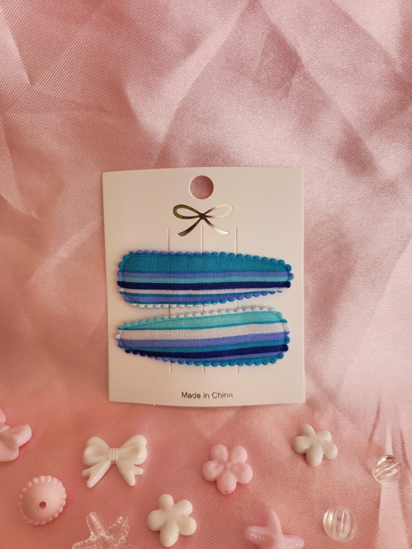 Kind klikspeld blauw gestreept