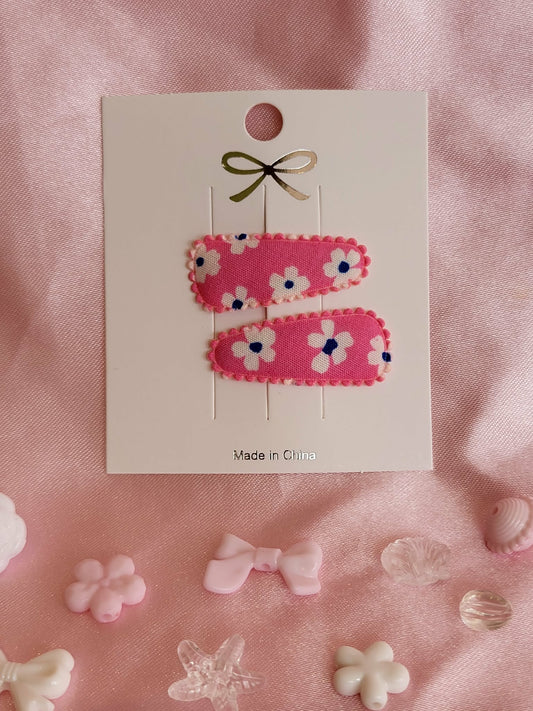 baby klikspeld roze met witte bloemen