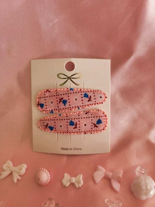 Kind klikspeld roze met kleine bloemetjes