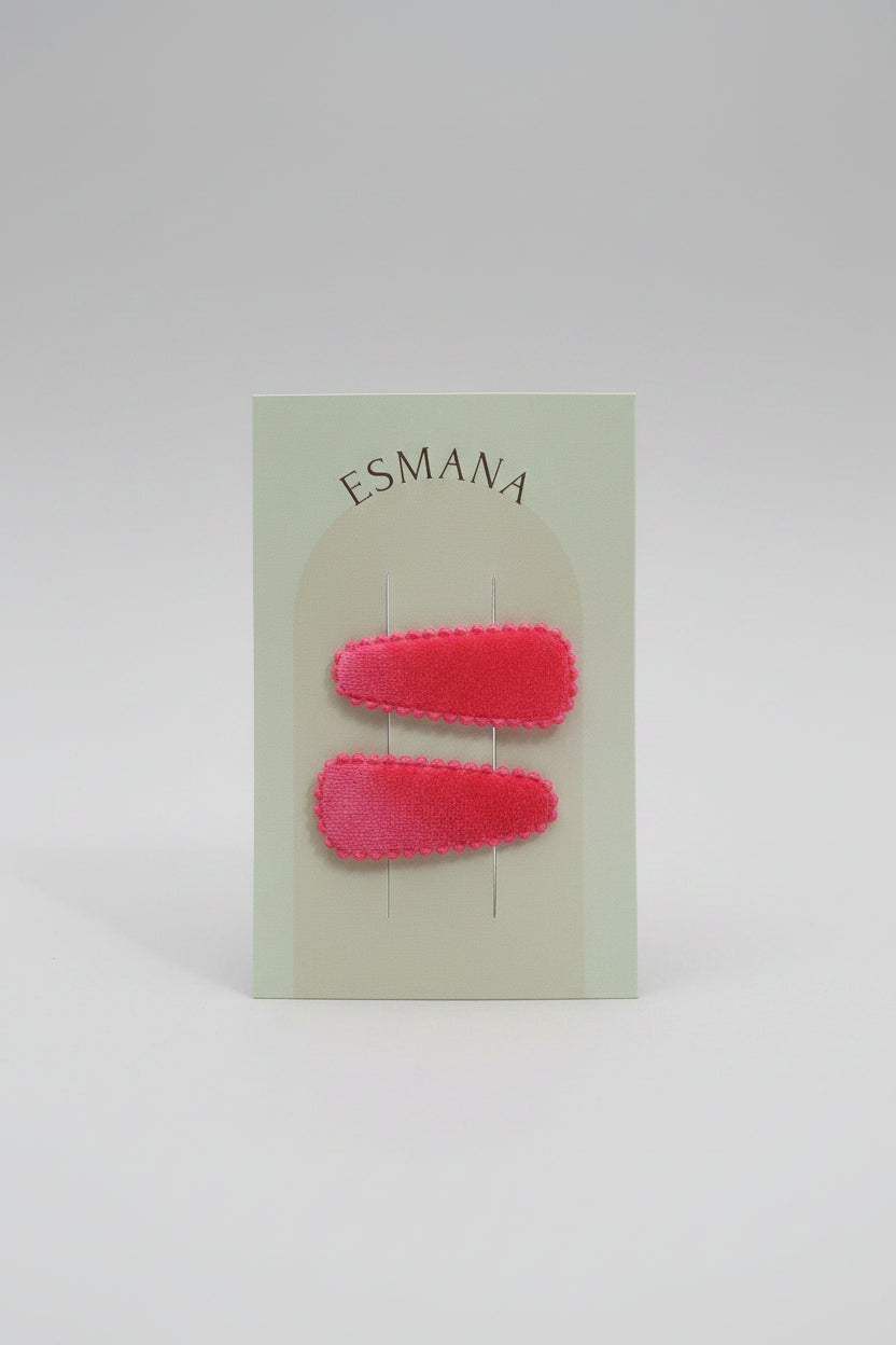 Baby klikspeld fluweel neonroze