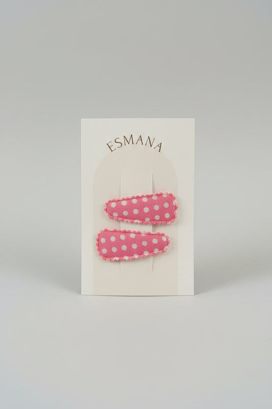 Baby klikspeld roze met witte stippen