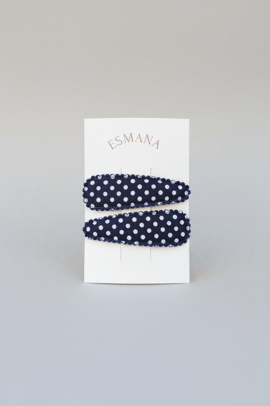 Kind klikspeld donkerblauw met witte stippen