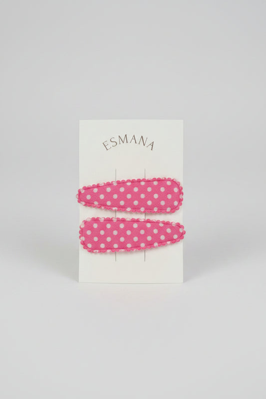 Kind klikspeld roze met witte stippen