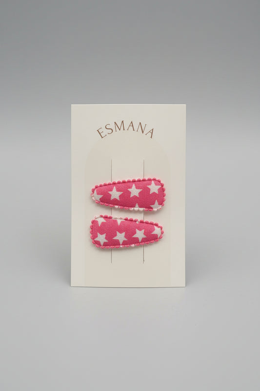Baby klikspeld roze met witte sterren
