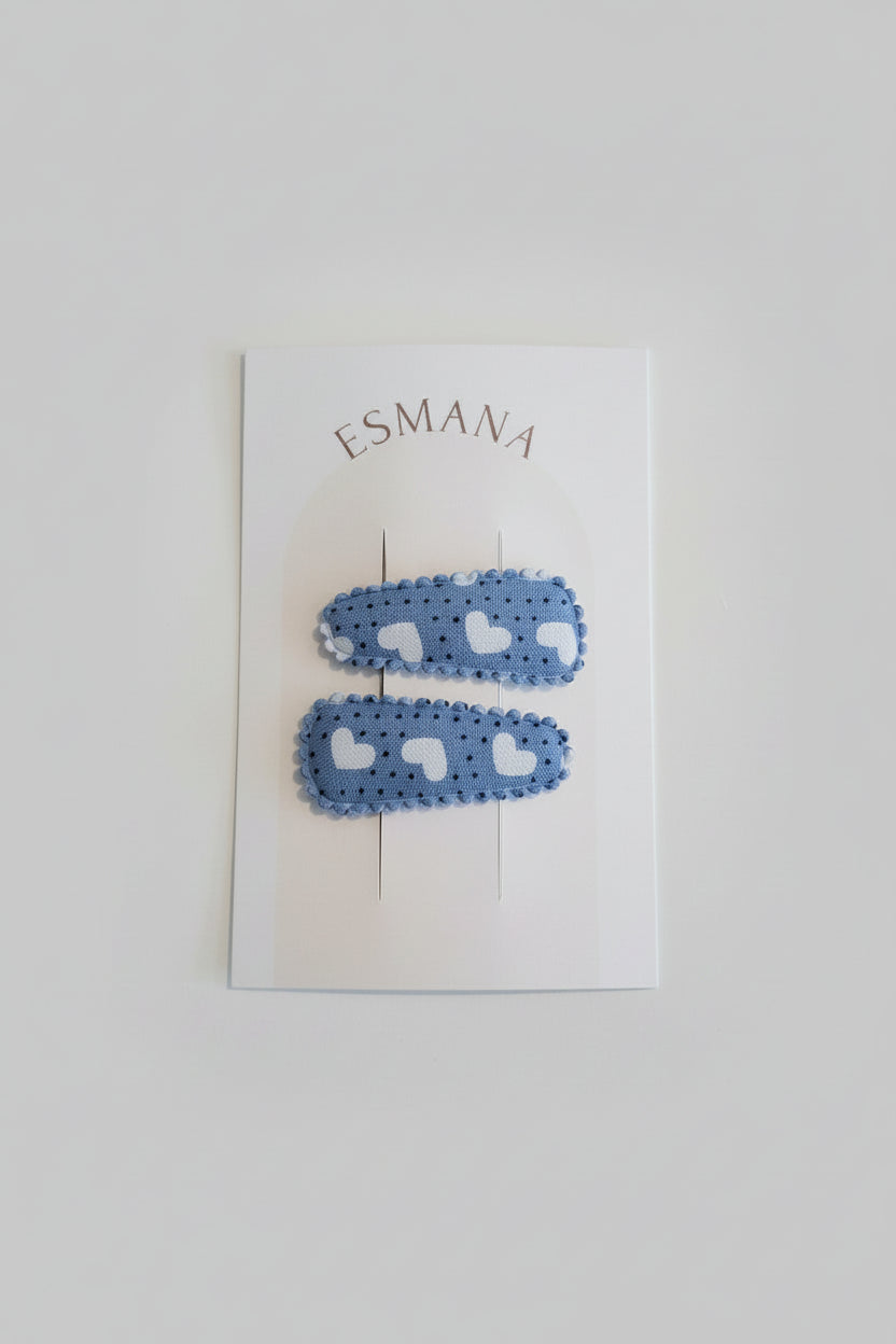 Baby haarspeldjes blauw met witte hartjes