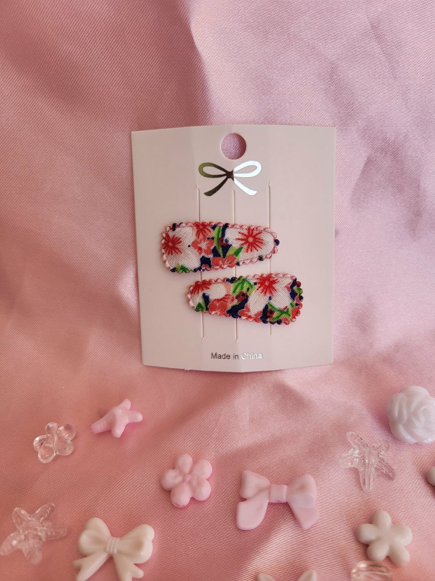 Baby klikspeld rode bloemen
