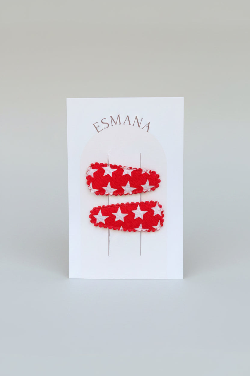 Baby klikspeld rood met witte sterren