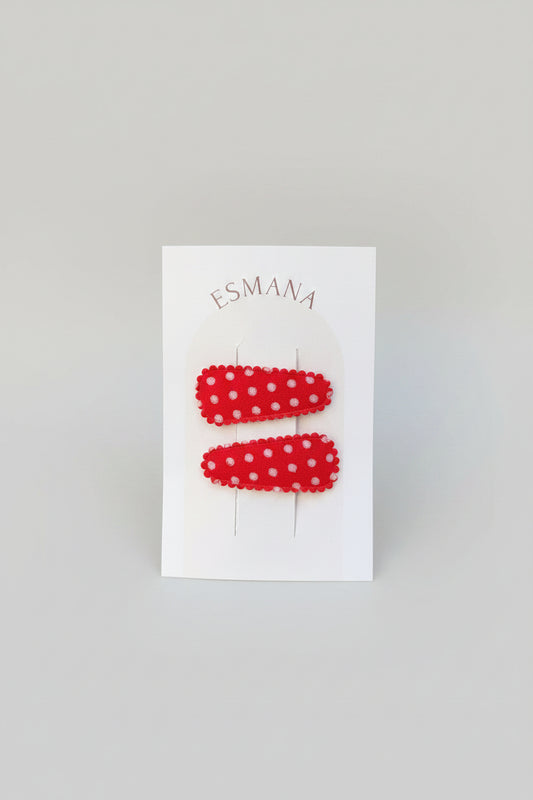 Baby klikspeld rood met witte stippen