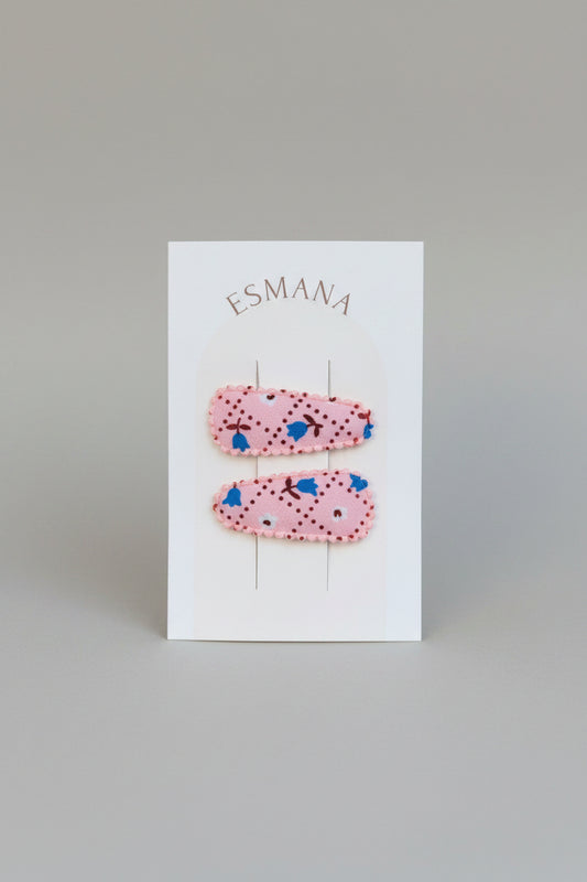 Baby klikspeld roze met kleine bloemetjes
