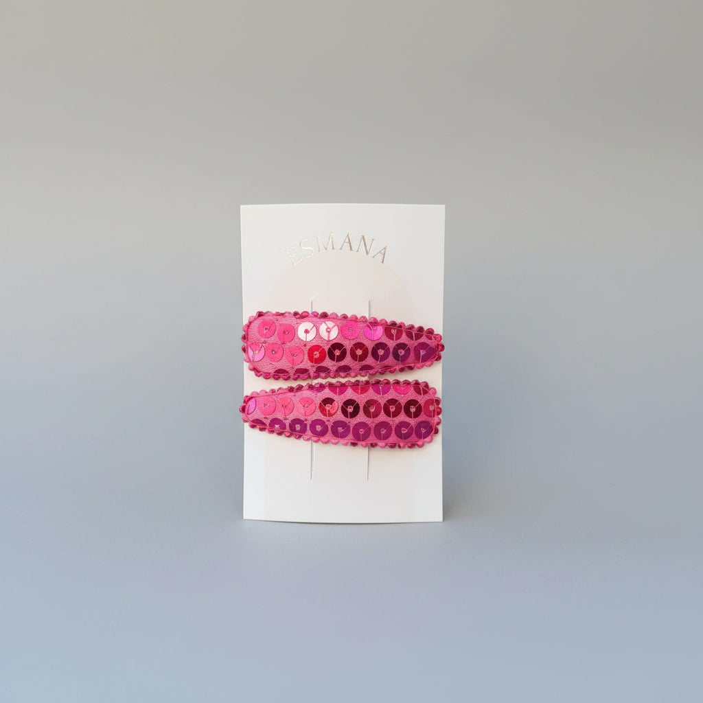 Kind klikspeld roze met roze pailletten
