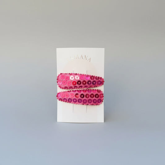 Kind klikspeld roze met roze pailletten