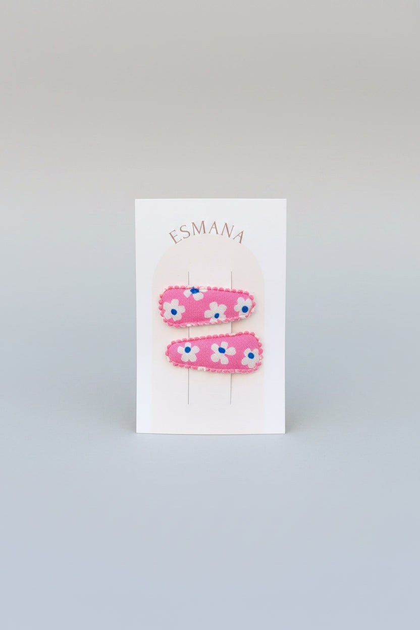 baby klikspeld roze met witte bloemen