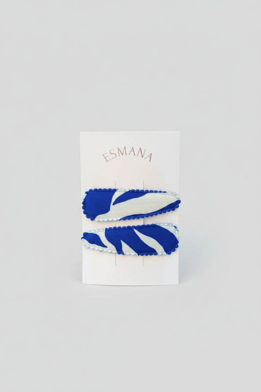 Kind klikspeld blauw en witte golven